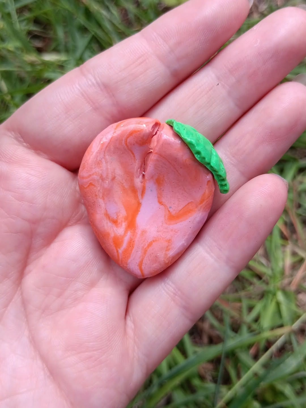 Handmade Marbled Peach Clay Worry Stone with Green Leaf